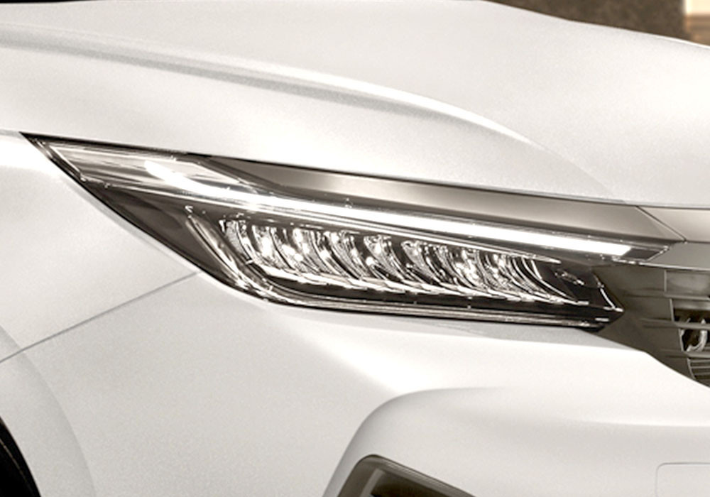 Full LED Headlight with LED Daytime Running LightAura kemewahan semakin terpancar melalui New Full LED Headlamp, yang menghasilkan sorot lampu lebih tajam.
Tidak hanya itu, sepasang LED Daytime Running Light turut membingkai Headlamp sehingga tampak lebih memikat serta meningkatkan visibilitas kendaraan di siang dan malam hari.
Honda Indonesia Image
Honda Indonesia Image