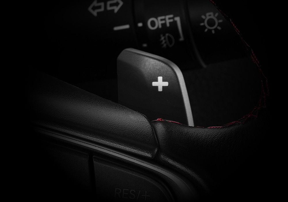 Paddle Shift
Honda City Hatchback RS telah dilengkapi dengan fitur Paddle Shift, yang memberikan kemudahan untuk mengatur perpindahan transmisi hanya dengan menggunakan ujung jari.
Pengendara dapat menaikkan gigi pada Paddle Shift saat membutuhkan akselerasi lebih, atau menurunkan gigi saat ingin melakukan engine brake.
Selain lebih praktis, Anda juga dapat merasakan sensasi berkendara yang menyenangkan layaknya mengendarai kendaraan bertransmisi manual.